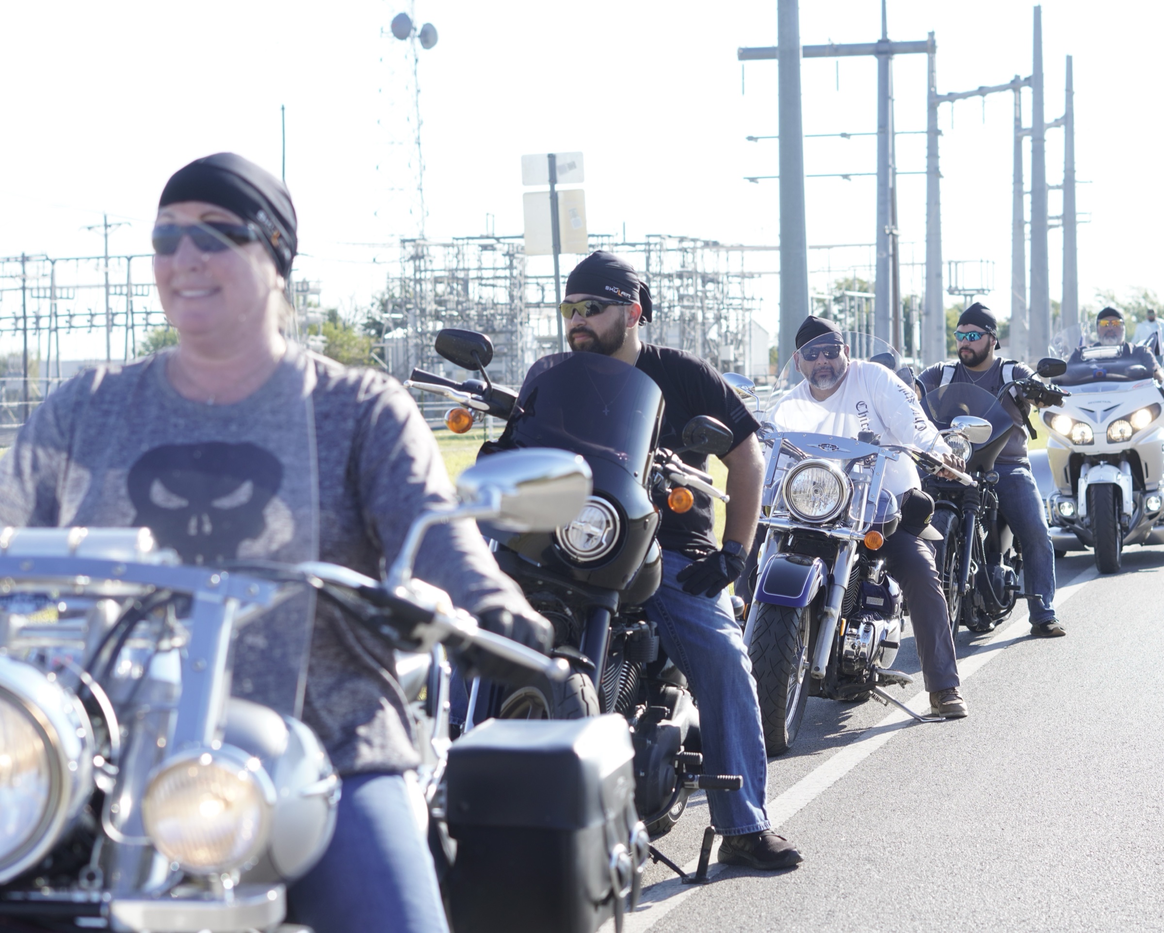 A group of SKULAIR riders on their bikes, ready to ride together